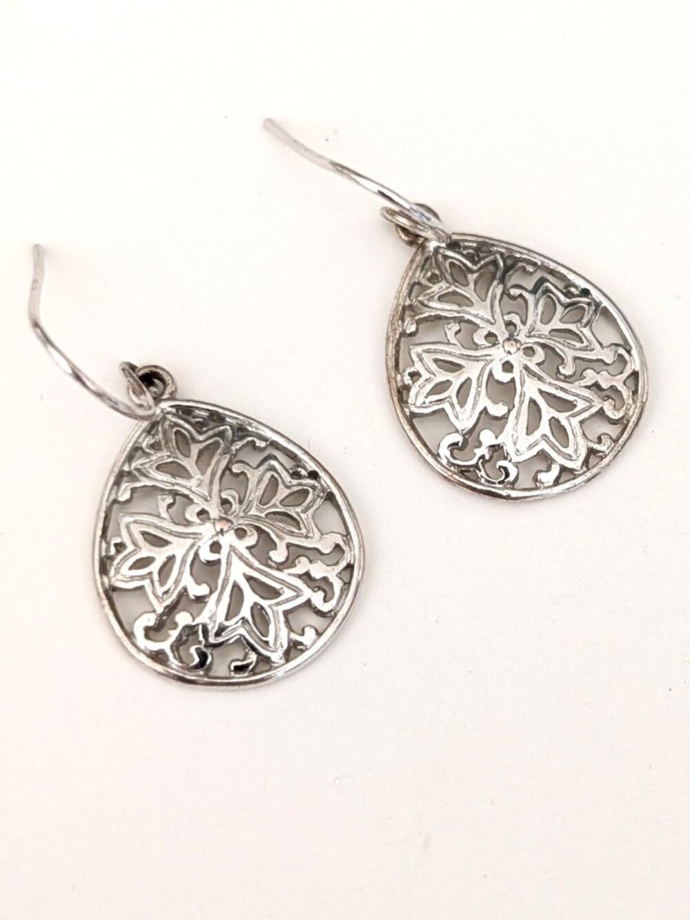 Open work silver tone teardrop earrings